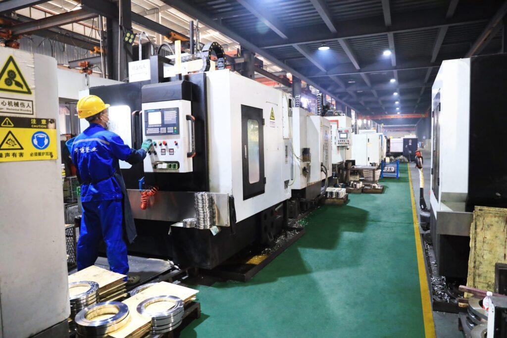 CNC machining line for flanges in the HuaboPipe workshop in Lishui
