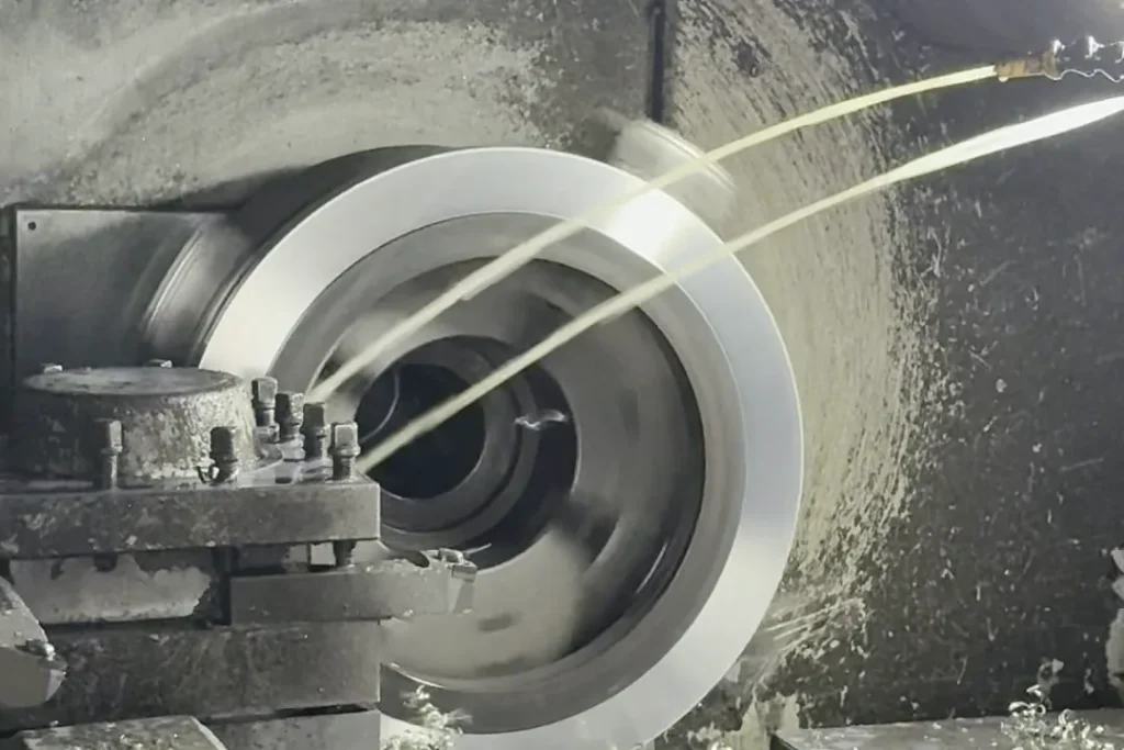 Turning the bore and face of a stainless steel flange ring on a lathe